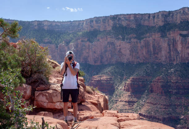 istock Photographer in canyon lands 2201565845