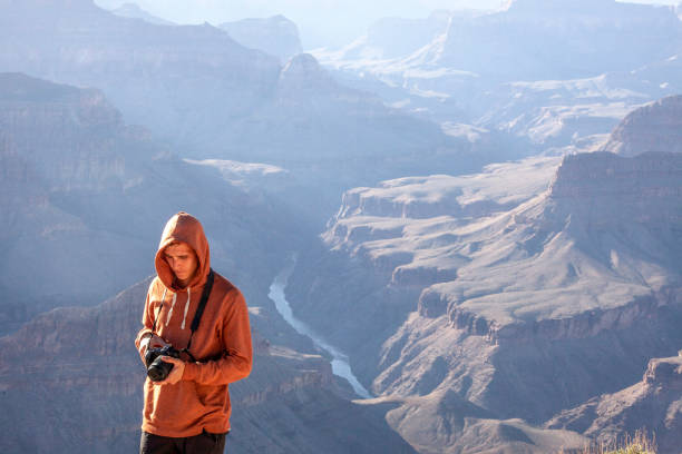 istock Photographer in canyon lands 2201565947
