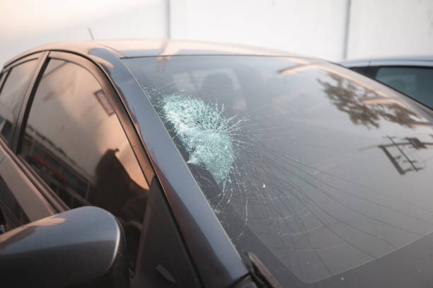 Accident Aftermath The broken glass suggests the vehicle may have been involved in an accident stock photo