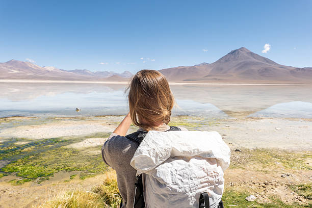 istock Traveler with Backpack Captures Scenic Mountain Lake View 2201594694