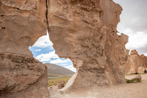 istock Eroded Rock Arch in a Remote Desert Landscape 2201595370