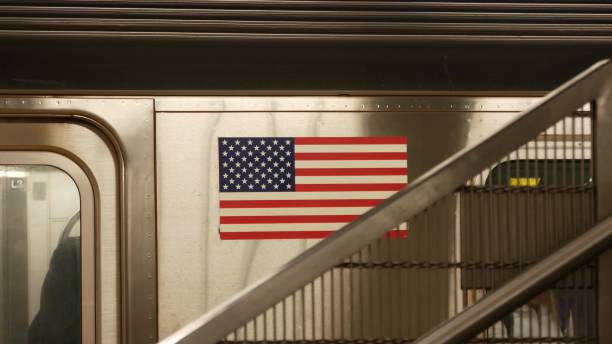 New York City, United States - 1 Sept 2023: Subway station interior, underground metropolitan platform. Metro railway passenger public transport. Manhattan railroad transportation, NYC traffic. People