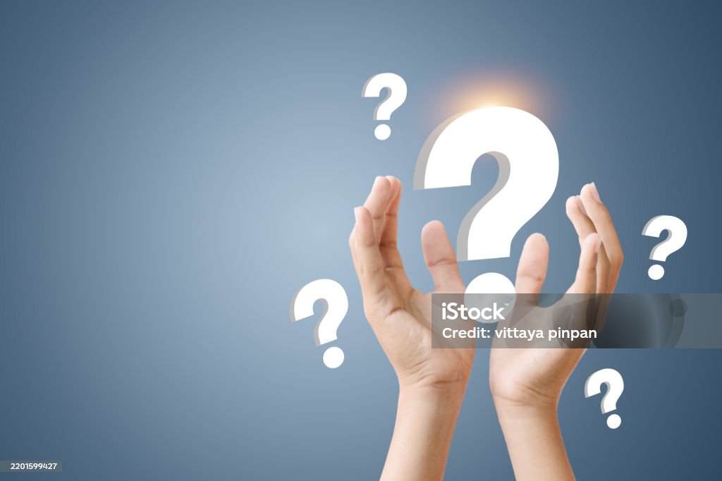 W/question Hand A Hand Holding A Question Mark With Other Question Marks Surrounding It ...