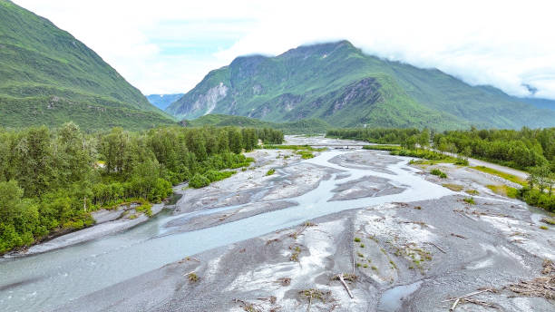 Drone picture of waters flowing into the Port of Valdez. This beautiful setting draws tourists from around the world. Many will come to visit Prince William Sound throughout the summer months.