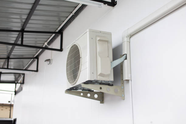 istock Cooling air conditioner installed at the eaves of the house 2201611472