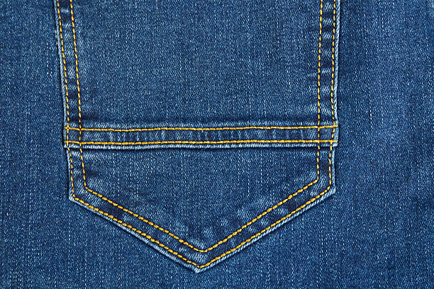 istock Blue denim fabric with distinct stitching on the pocket 2201611635