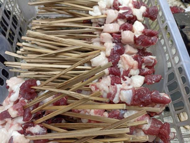 istock Group of Goat Sate ready to be grilled. Raw goat satay 2201612365