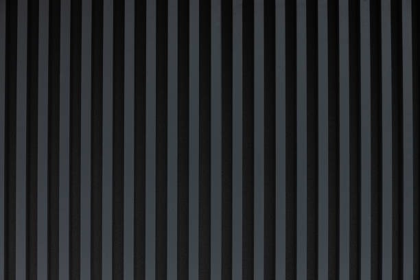 istock Dark gray striped background, wall on the street. 2201623971