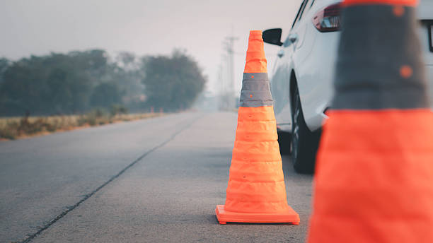 istock Cars have problems and traffic cones to warn other road users. 2201624272