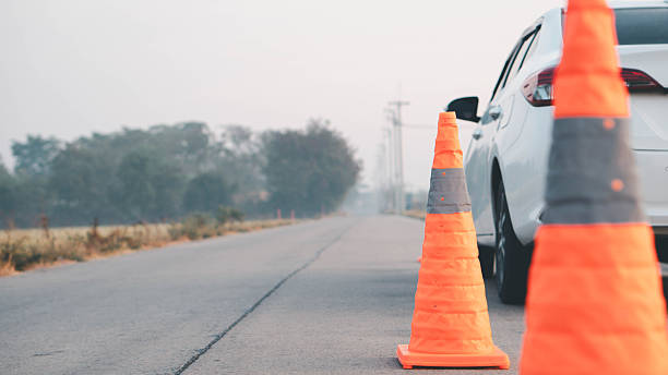 istock Cars have problems and traffic cones to warn other road users. 2201624448