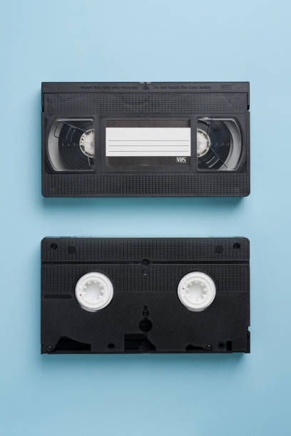 istock Top view of old VHS video tape on blue background 2201625125