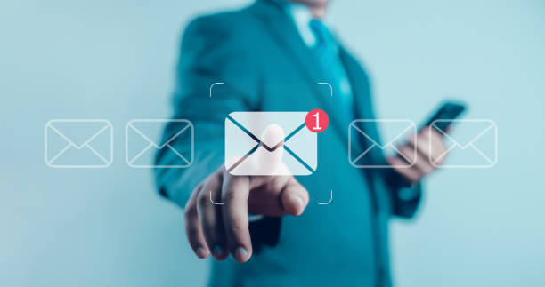 istock digital marketing, businessman responding to floating digital interface showing new email notification symbol. 2201629606