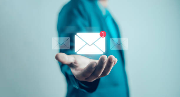 istock New email notification concept, business online communication, email communication, digital marketing, businessman responding to floating digital interface showing new email notification symbol. 2201629615