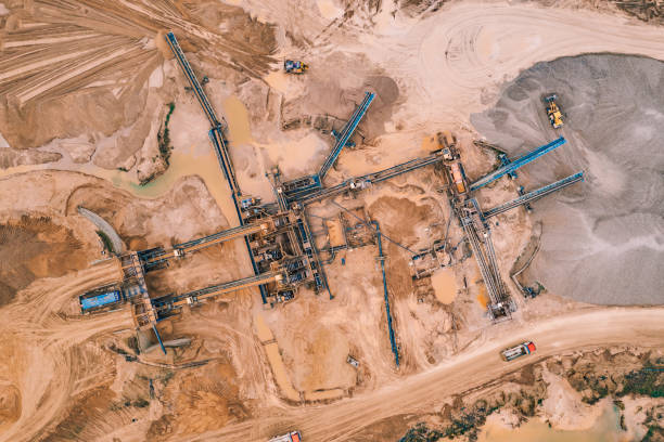 istock Aerial top view of open pit development and sand extraction. Mining industry Reserves 2201631306