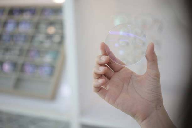istock Hand a doctor holding glasses lenses 2201633006
