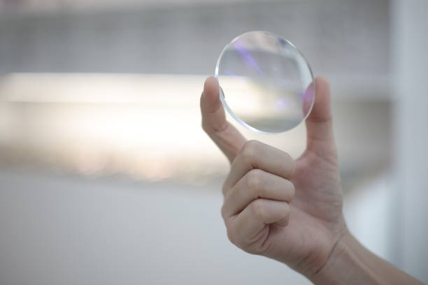 istock Hand a doctor holding glasses lenses 2201633012