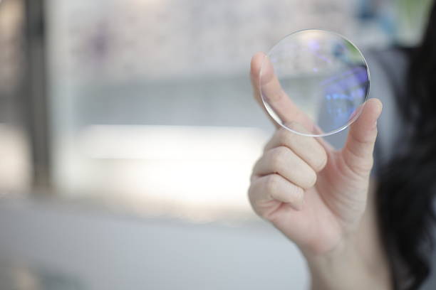 istock Hand a doctor holding glasses lenses 2201633053