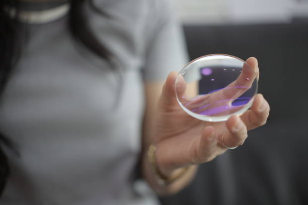 istock Hand a doctor holding glasses lenses 2201633160