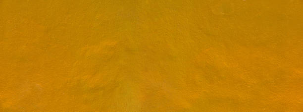 istock Gold texture background. Concrete wall texture paint, gold color surface blank for design 2201634480