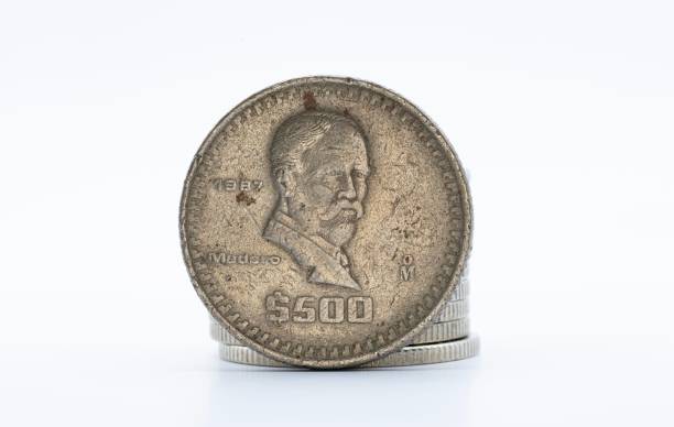 istock 500 Mexican Peso Coin Close-Up 2201639473