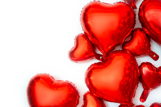 istock frame for text and foil balloons in the shape of hearts 2201641136