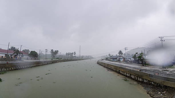 istock Overcast River Landscape on a Rainy Day 2201642744