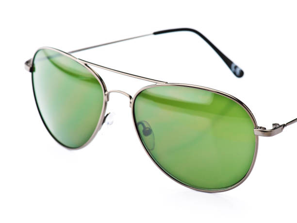 istock Sunglasses with green lenses on a white background showcasing modern style and design 2201649206