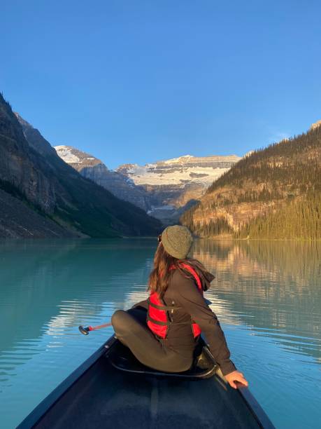 istock Canoeing on Lake Louise with Mountain Views 2201652121