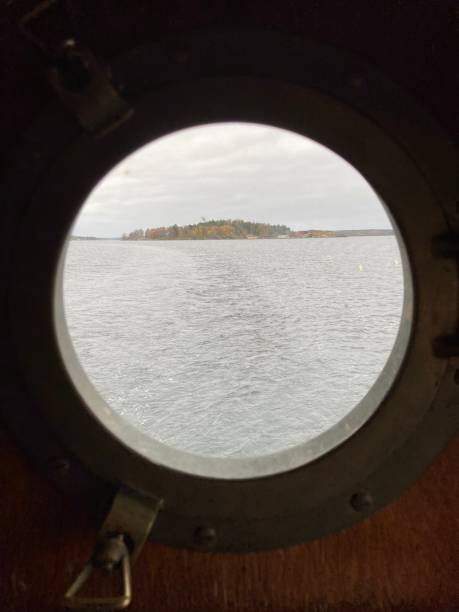 istock small island in old porthole scandinavia 2201654058