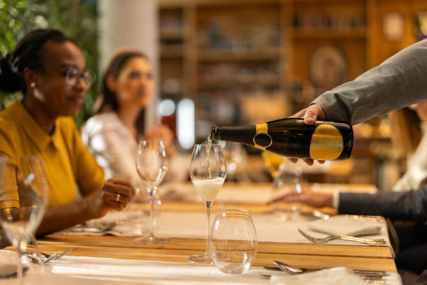 istock Multiracial group of people tasting wine in luxury restaurant 2201655424