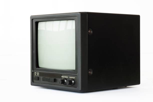 Vintage black CRT monitor with brightness and contrast knobs isolated on white background.
