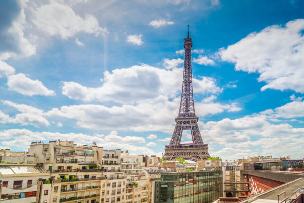 istock eiffel tour and Paris cityscape 2201656994
