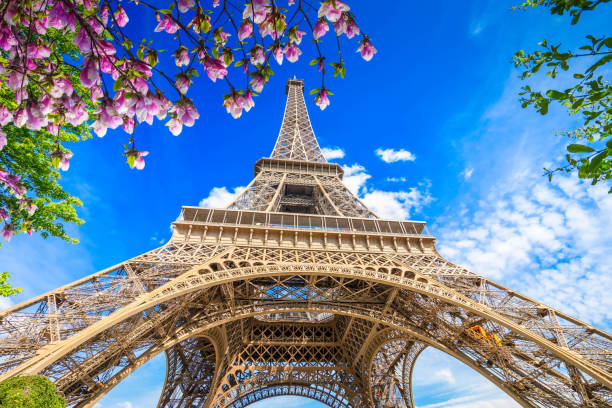 istock eiffel tour and Paris cityscape 2201657572