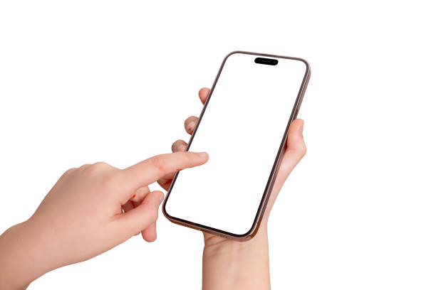 istock Children hands covered in marker and crayon doodles holding a modern smartphone, right hand gripping while left hand touches the screen, isolated background and display for app or game promotion 2201658681