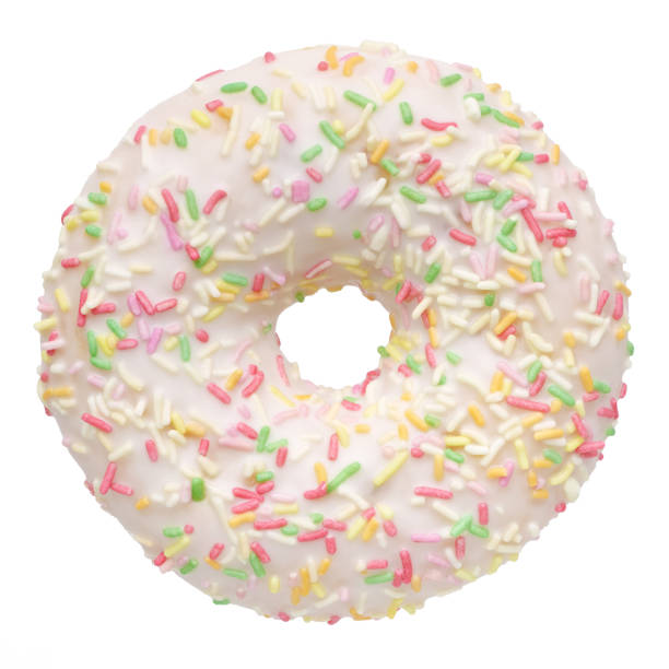 istock Single donut decorated with white icing and colorful sprinkles 2201659064