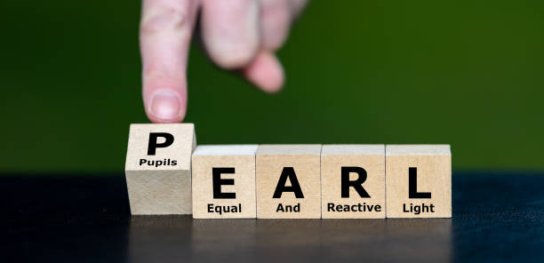 istock Cubes form the acronym PEARL (Pupils Equal And Reactive to Light). Symbol for neurological assessment. 2201662707