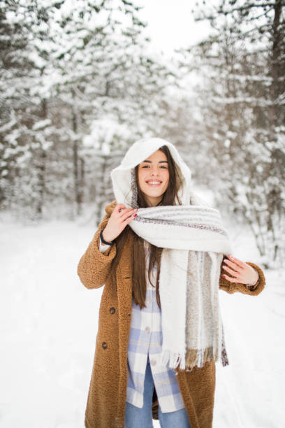istock Daydreaming in snowy woods 2201663965