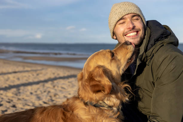 Loving Dog Giving Owner Kisses