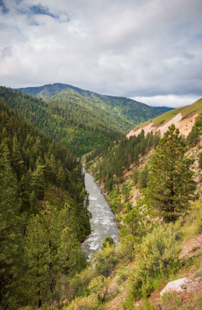 istock River Winding Through the Sawtooth Mountains, Mountain range in Idaho 2201667441