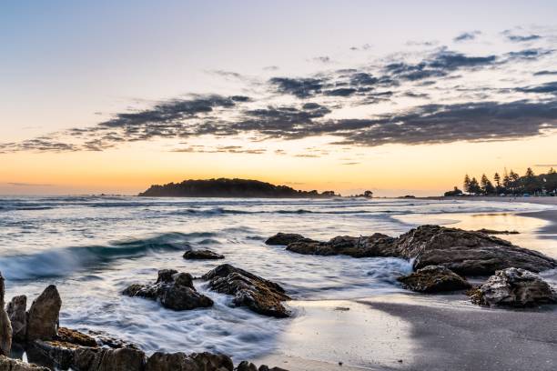 istock Coastal landscape at sunset with rocky shoreline. 2201672562