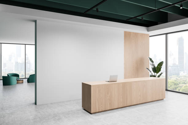 istock Modern reception area with wooden desk and white wall in office interior. 3D Rendering 2201674165