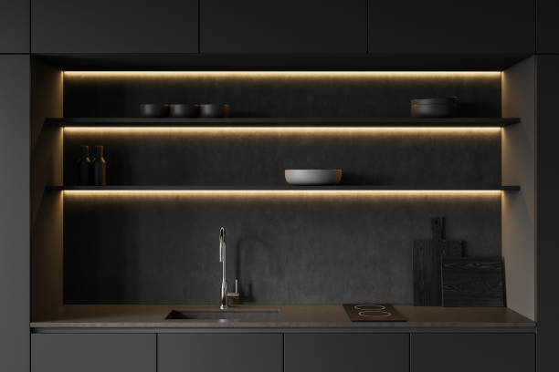 istock Modern kitchen interior with illuminated shelves and dark cabinets. 3D Rendering 2201674652