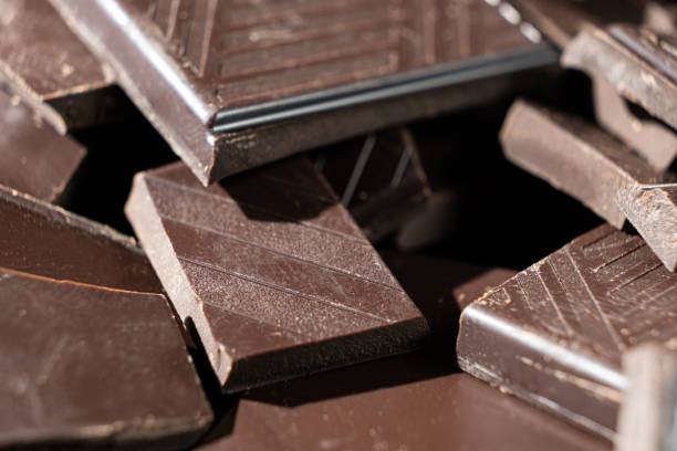 istock Indulgent Black Chocolate Squares with Glossy Elegant Look 2201674855