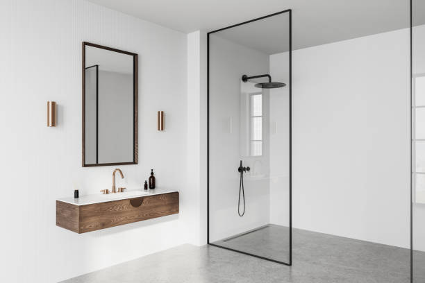 istock Modern bathroom interior with wooden vanity and glass shower enclosure. 3D Rendering 2201675239