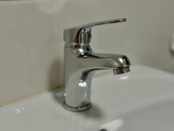 istock Chrome plated water faucet in the bathroom 2201681455