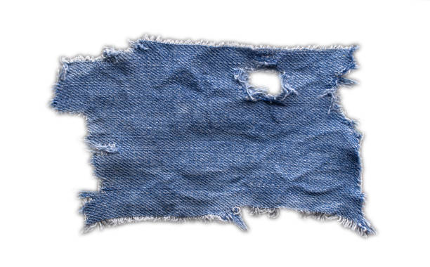 istock jeans. a frayed and torn piece of denim rag 2201681698