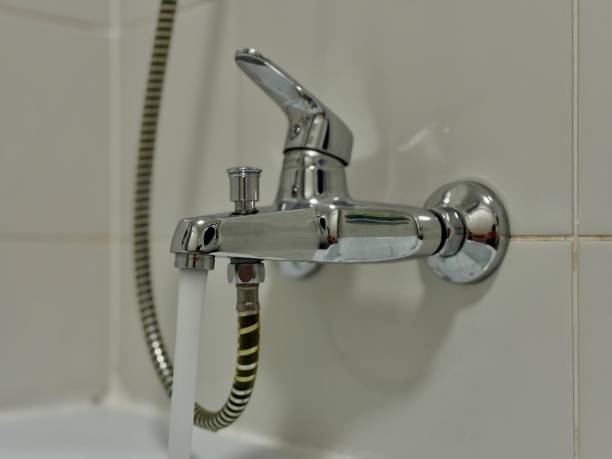 istock Chrome plated water faucet in the bathroom 2201683950