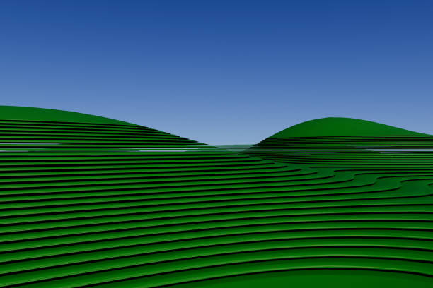 istock A green hillside with a blue sky in the background 2201687567