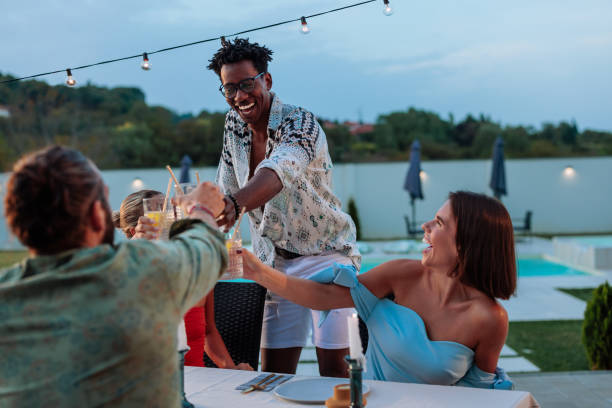 istock Friends enjoying a lively outdoor celebration 2201690213