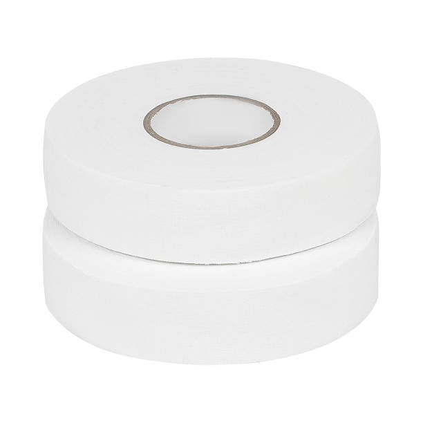 istock A roll of white tape that has a hole located in the middle section 2201690739